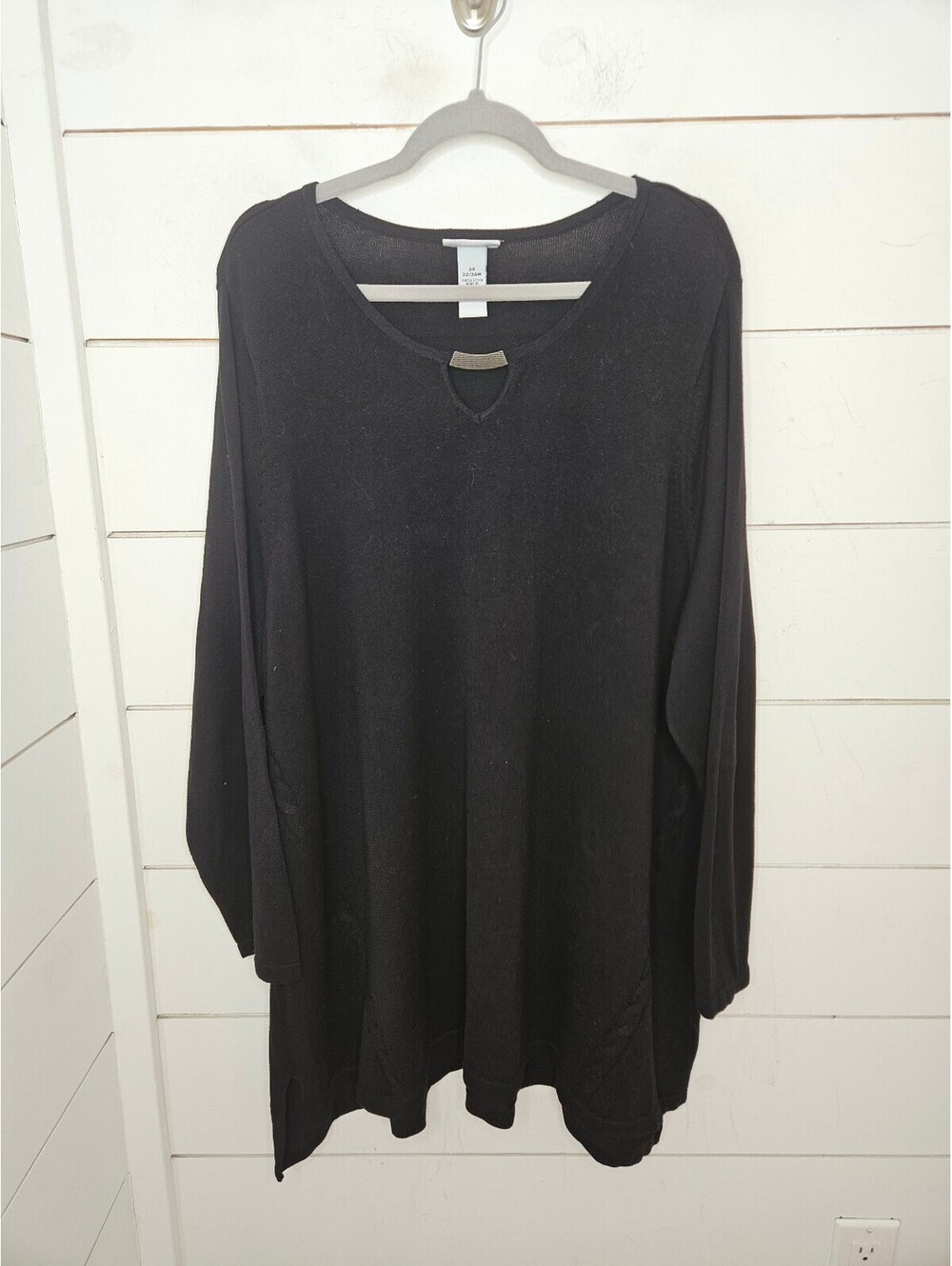 Catherines 2X size 22/24W black sweater with cut out at front of scoop neck